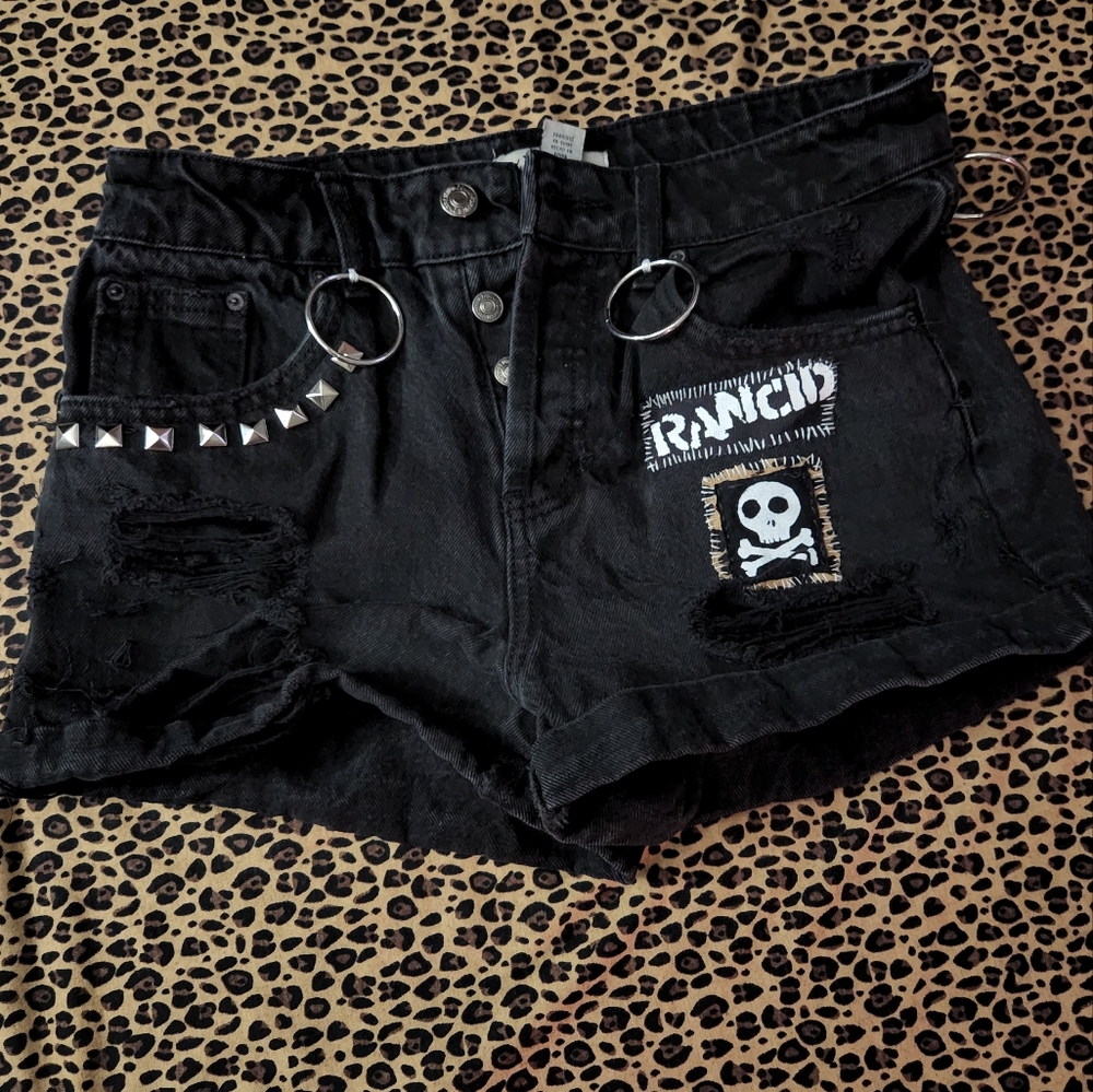 High waisted black short shorts with Rancid patch and O rings